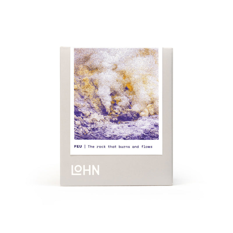 lohn feu oraganic coconut and soy wax hand poured candle in box with purple and yellow label