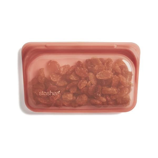 stasher snack bag terracotta with raisins inside