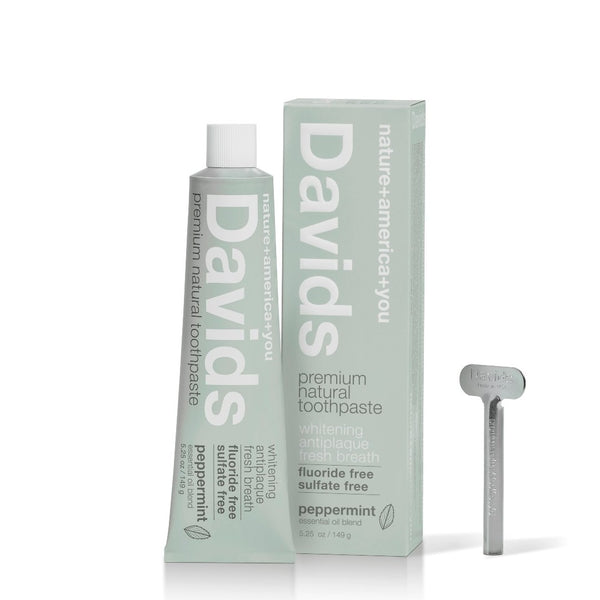 davids natural toothpaste peppermint tube box and key standing upright