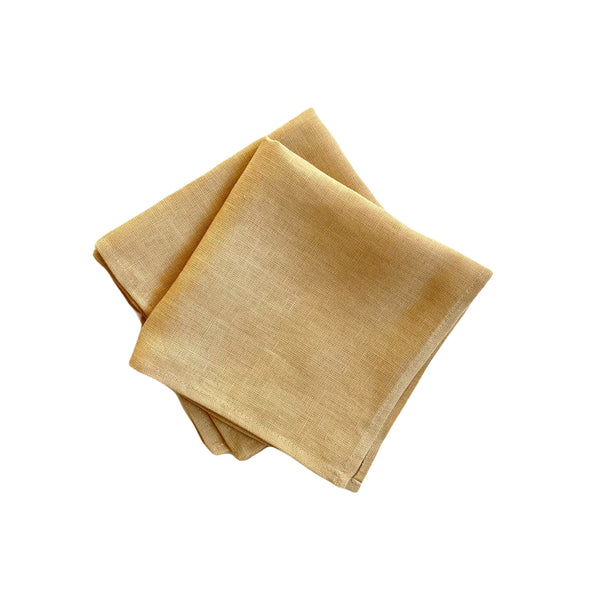 two linen napkins in light caramel