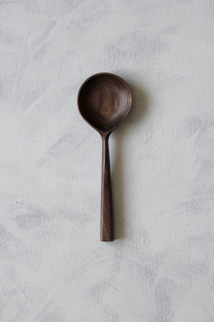 the woodsmans daughter hand carved walnut round serving spoon