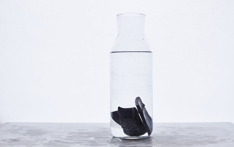 water carafe with bamboo charcoal filters in it