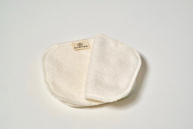 reusable organic cotton and bamboo facial rounds laid flat and folded over