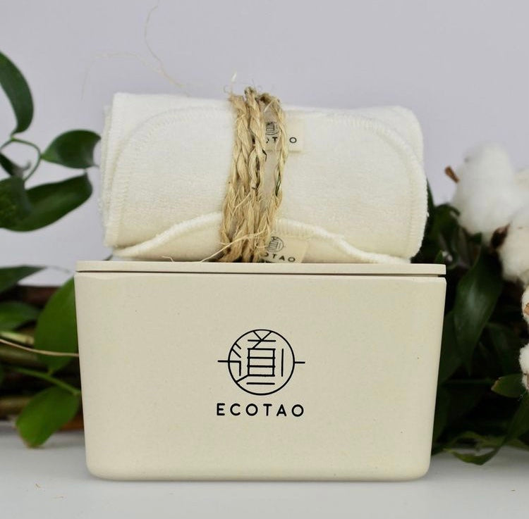 biodegradable bamboo fibre box for facial wipes with rolled facial rounds on top of box
