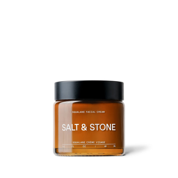 salt and stone squalane facial creme in amber glass jar with black lid