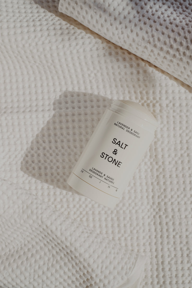 open salt and stone lavender and sage natural deodorant on towel