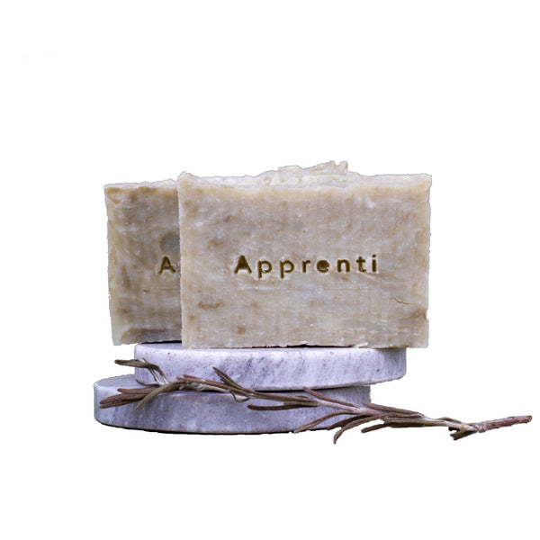 apprenti organik natural herbal soap bar basic on top of two ceramic coasters