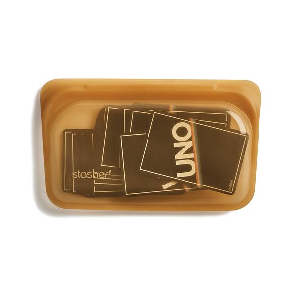 stasher snack bag honey holding a desk of cards